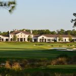 Panoramic view of a lush green golf course at The Concession Golf Club. Smooth