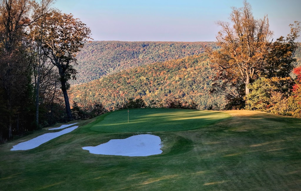 Panoramic view of a lush green golf course at The Course at Sewanee. Smooth