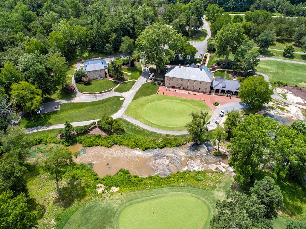 Panoramic view of a lush green golf course at The Foundry Golf Club. Smooth