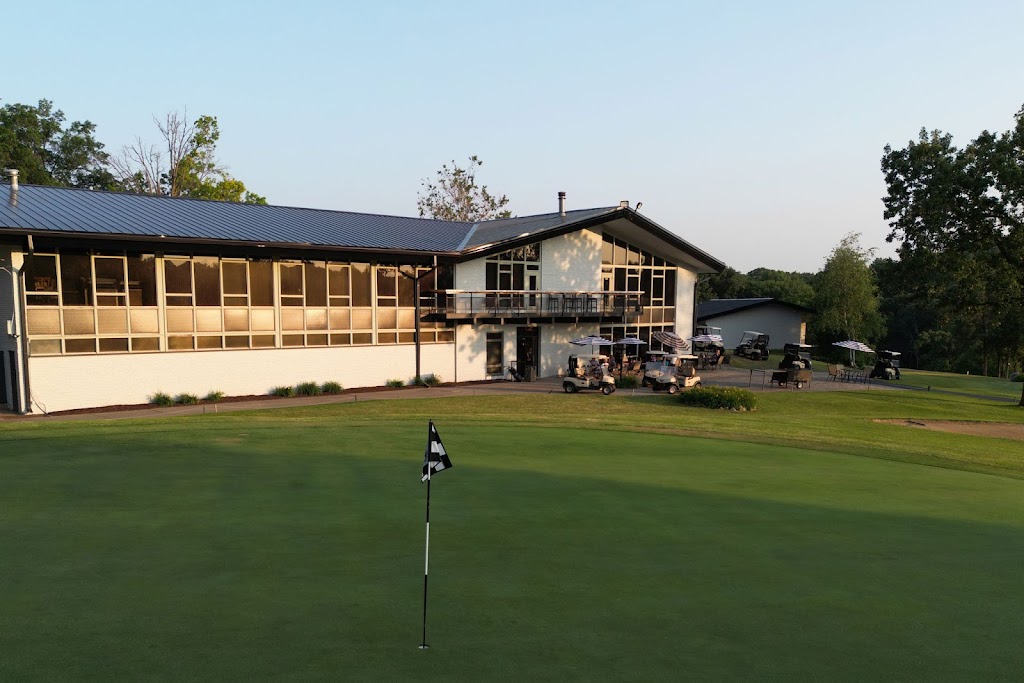 Panoramic view of a lush green golf course at The Freeport Club. Smooth