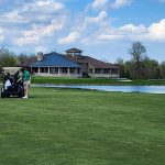 green grass with the flag in the hole.