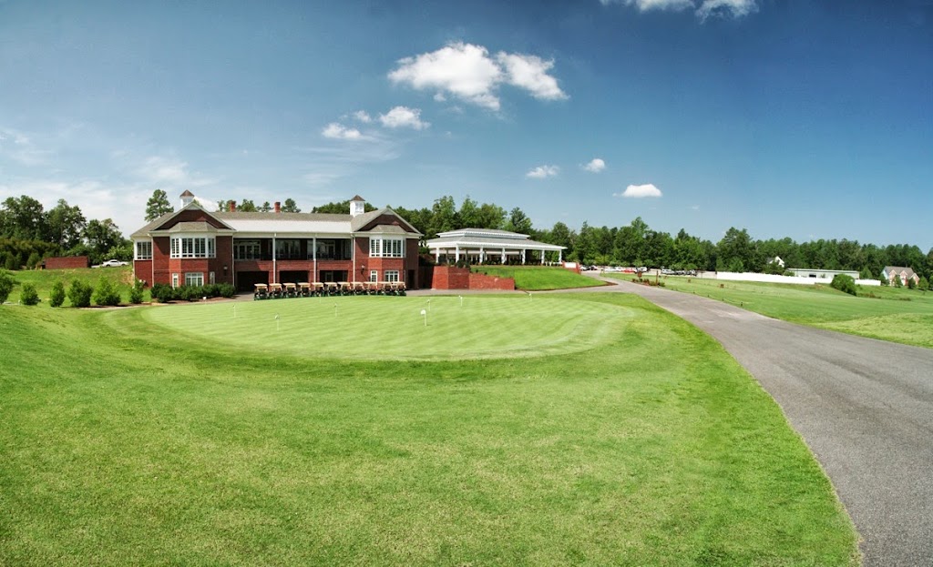Panoramic view of a lush green golf course at The Golf Club at The Highlands. Smooth