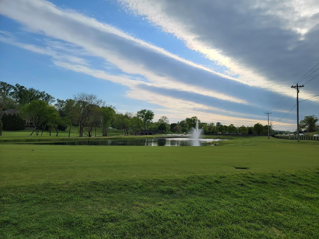 Panoramic view of a lush green golf course at The Governors Club. Smooth