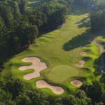 Panoramic view of a lush green golf course at The Green Course at Golden Horseshoe Golf Club. Smooth