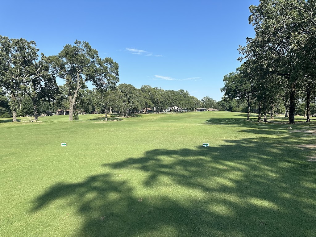 Panoramic view of a lush green golf course at The Greens at North Hills. Smooth