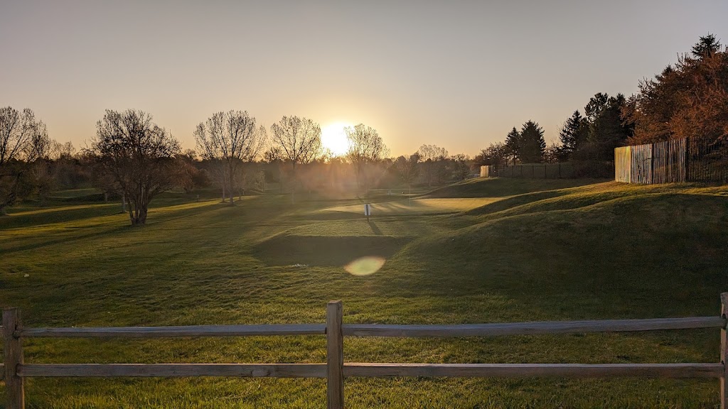 Panoramic view of a lush green golf course at The Greg Mastriona Golf Courses at Hyland Hills. Smooth