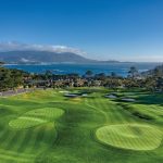 Panoramic view of a lush green golf course at The Hay. Smooth