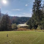Panoramic view of a lush green golf course at The Idaho Club. Smooth