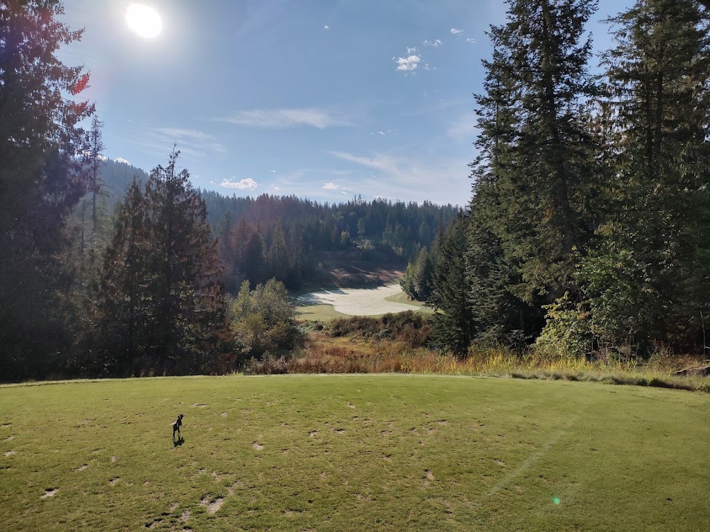 Panoramic view of a lush green golf course at The Idaho Club. Smooth