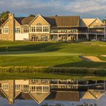 Panoramic view of a lush green golf course at The Legacy Club. Smooth