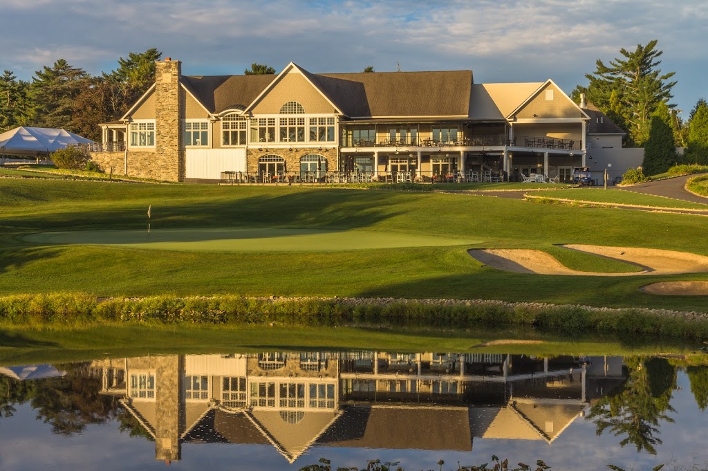 Panoramic view of a lush green golf course at The Legacy Club. Smooth