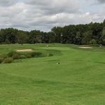Panoramic view of a lush green golf course at The Legends of Massillon. Smooth
