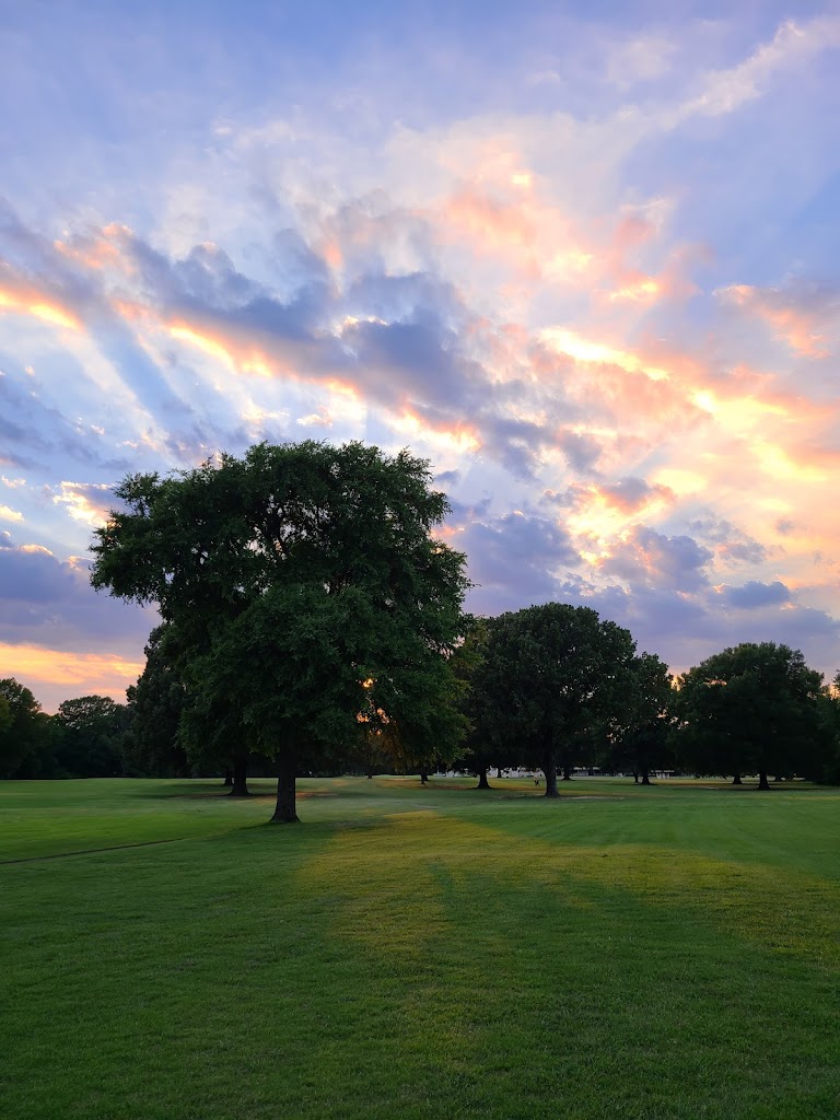 Panoramic view of a lush green golf course at The Links at Fox Meadows. Smooth