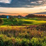 Panoramic view of a lush green golf course at The Links at Union Vale. Smooth