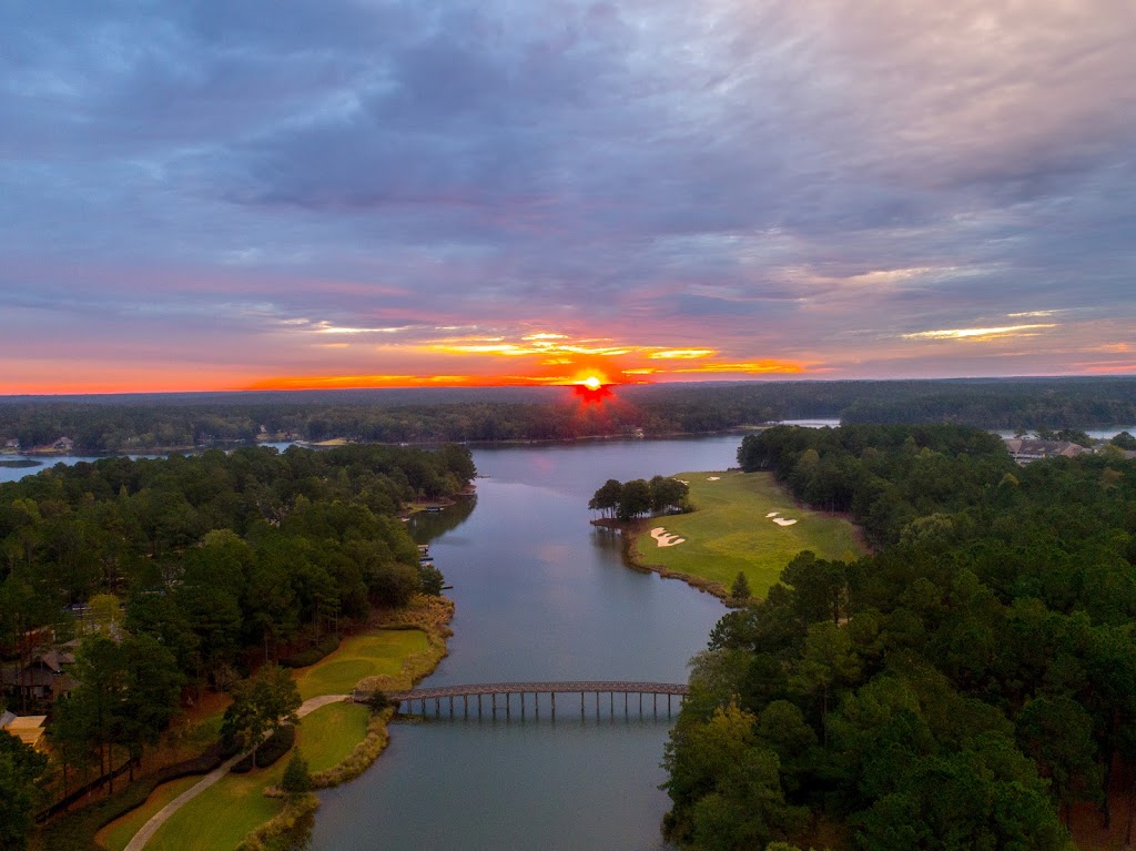 Panoramic view of a lush green golf course at The Oconee Course at Reynolds Lake Oconee. Smooth