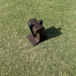 green grass with the flag in the hole.