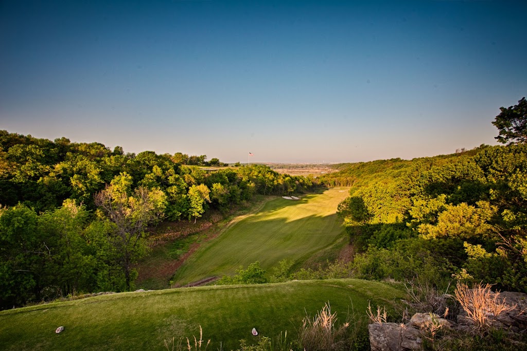 Panoramic view of a lush green golf course at The Patriot Golf Club. Smooth