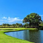 Panoramic view of a lush green golf course at The Plantation Course at Edisto. Smooth