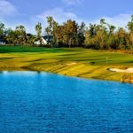 Panoramic view of a lush green golf course at The Preserve Golf Club. Smooth