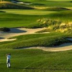 green grass with the flag in the hole.