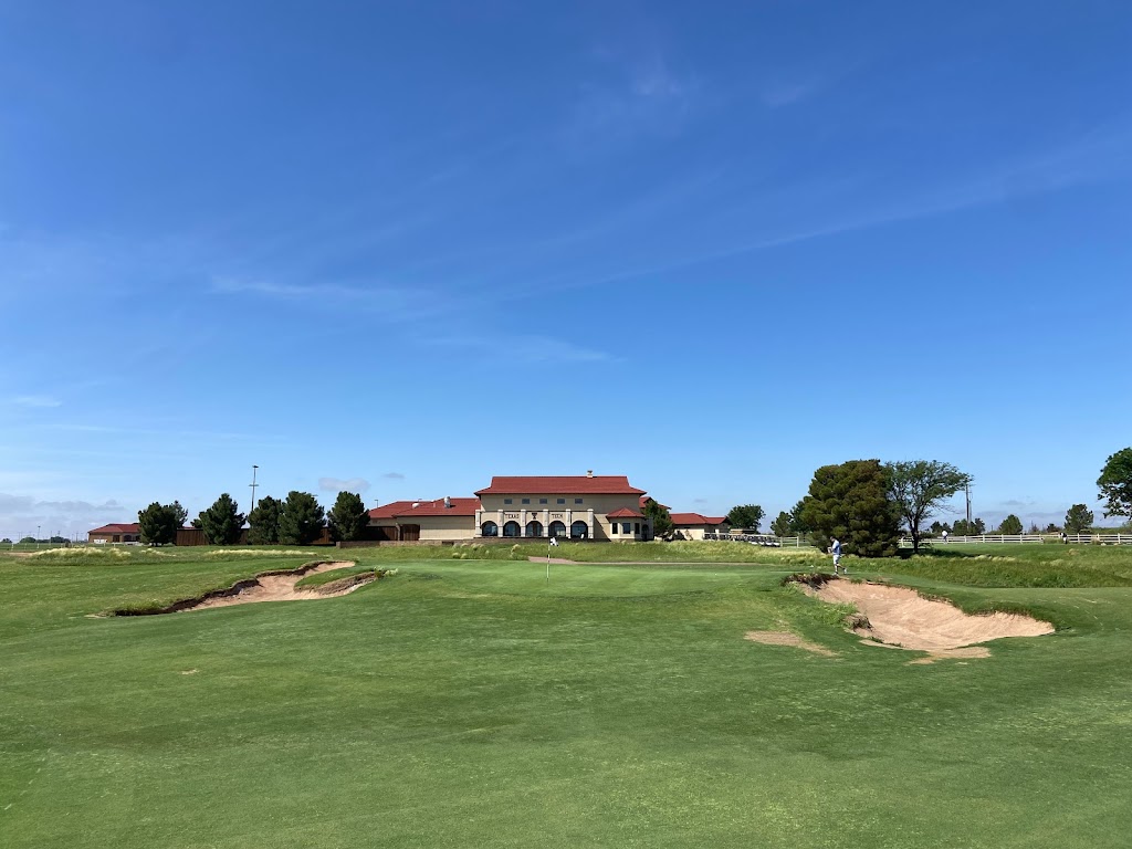 Panoramic view of a lush green golf course at The Rawls Course. Smooth