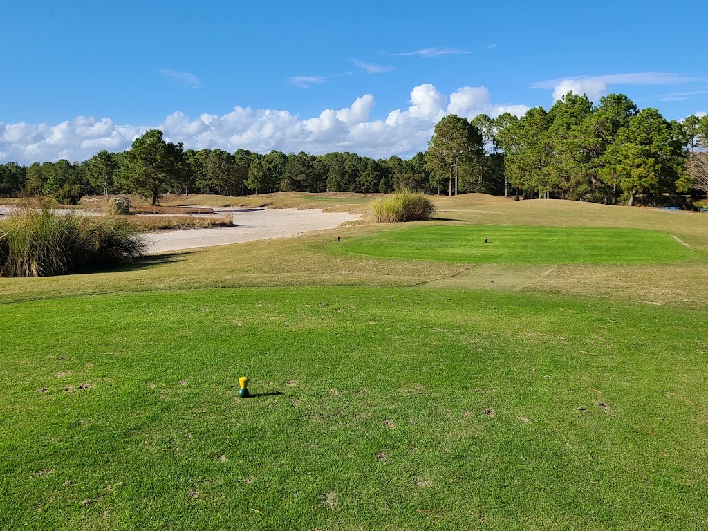 Panoramic view of a lush green golf course at Thistle Golf Club. Smooth
