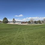 Panoramic view of a lush green golf course at Thorncreek Golf Course. Smooth