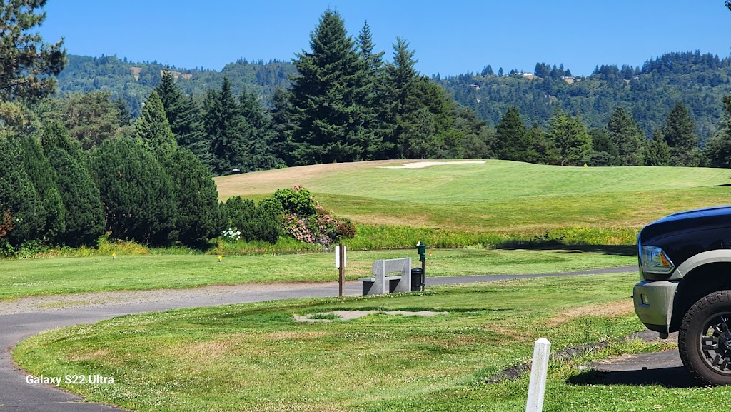Panoramic view of a lush green golf course at Three Rivers Golf Course. Smooth