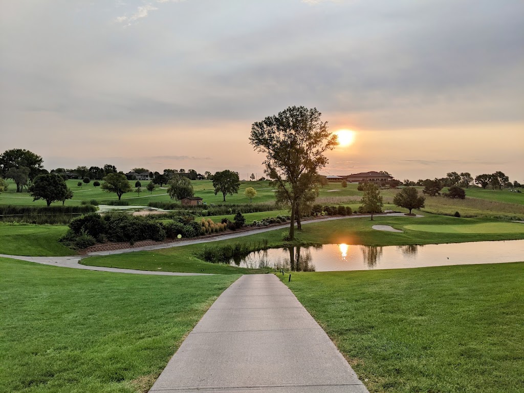 Panoramic view of a lush green golf course at Tiburon Golf Club & Banquet Facility. Smooth