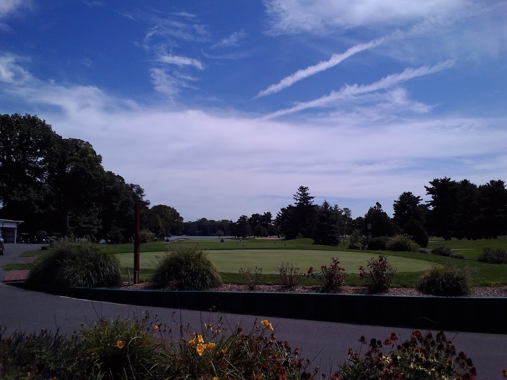 Panoramic view of a lush green golf course at Tippecanoe Country Club. Smooth
