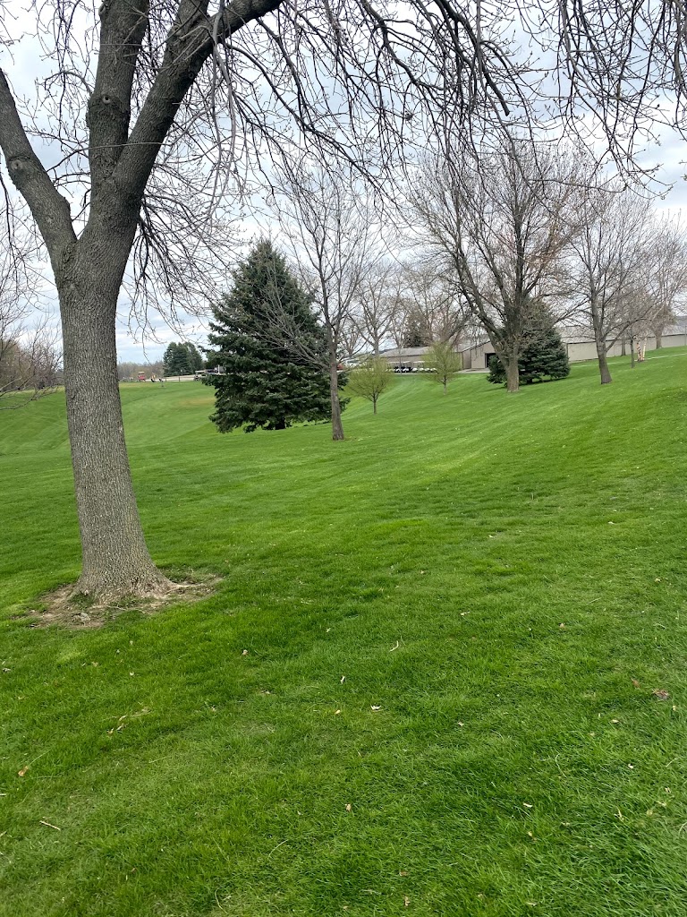 Panoramic view of a lush green golf course at Tipton Golf & Country Club. Smooth