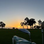 green grass with the flag in the hole.