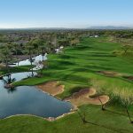 Panoramic view of a lush green golf course at Trilogy Golf Club at Vistancia. Smooth