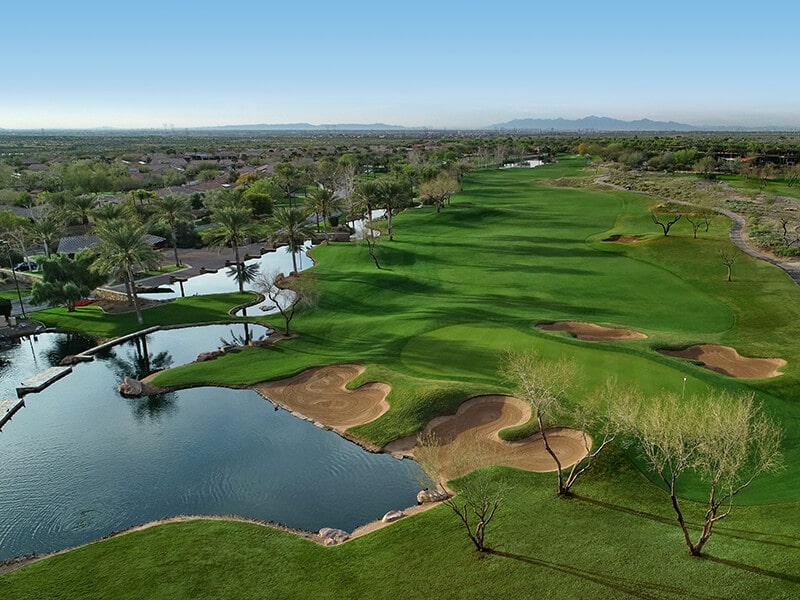Panoramic view of a lush green golf course at Trilogy Golf Club at Vistancia. Smooth
