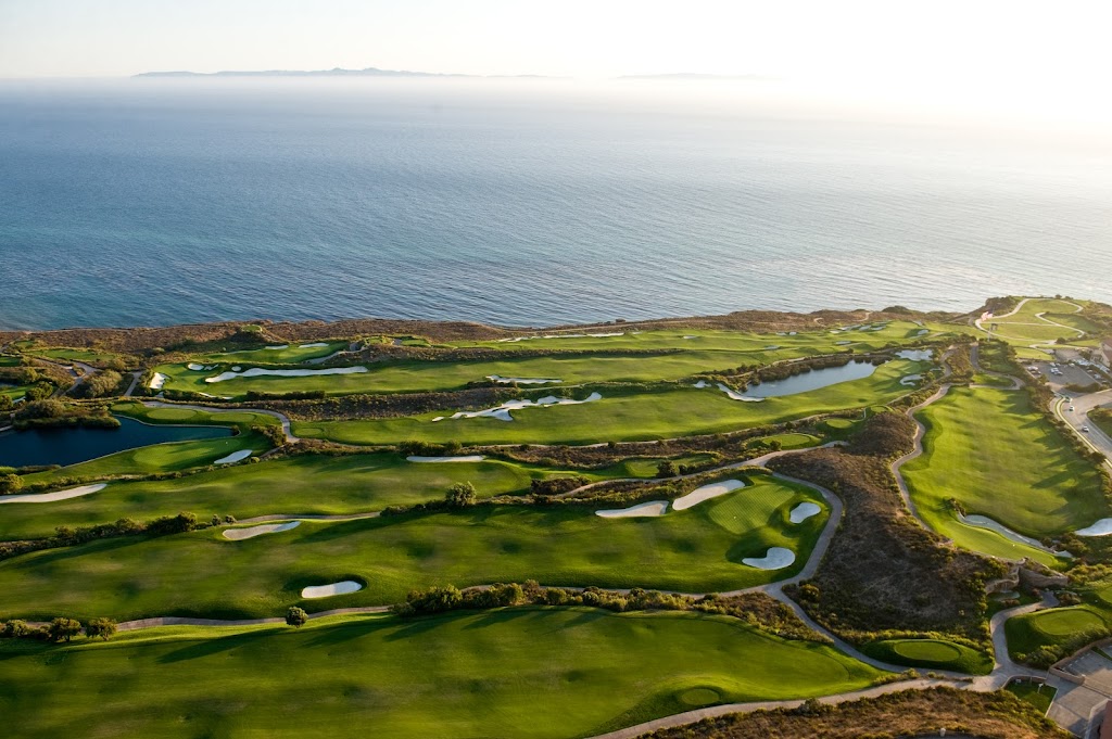 Panoramic view of a lush green golf course at Trump National Golf Club Los Angeles. Smooth