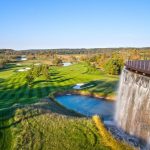 Panoramic view of a lush green golf course at Trump National Golf Club Washington DC. Smooth
