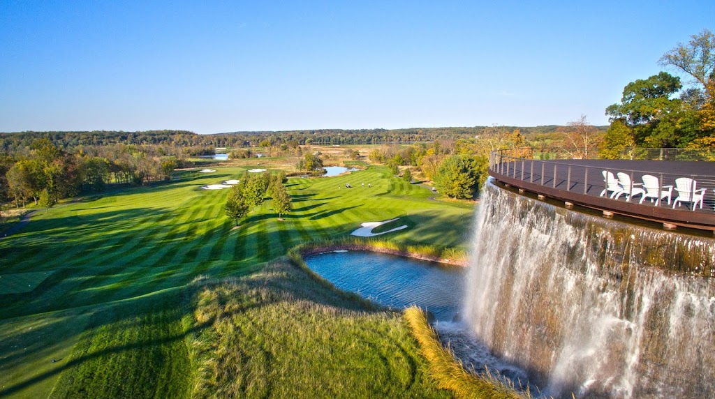 Panoramic view of a lush green golf course at Trump National Golf Club Washington DC. Smooth