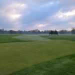 Panoramic view of a lush green golf course at Turnberry Golf Course. Smooth