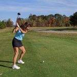 Panoramic view of a lush green golf course at Turner Highlands Golf Course. Smooth
