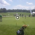 green grass with the flag in the hole.