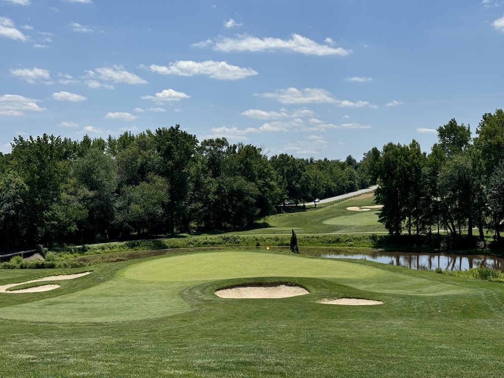 Panoramic view of a lush green golf course at University of Maryland Golf Course. Smooth