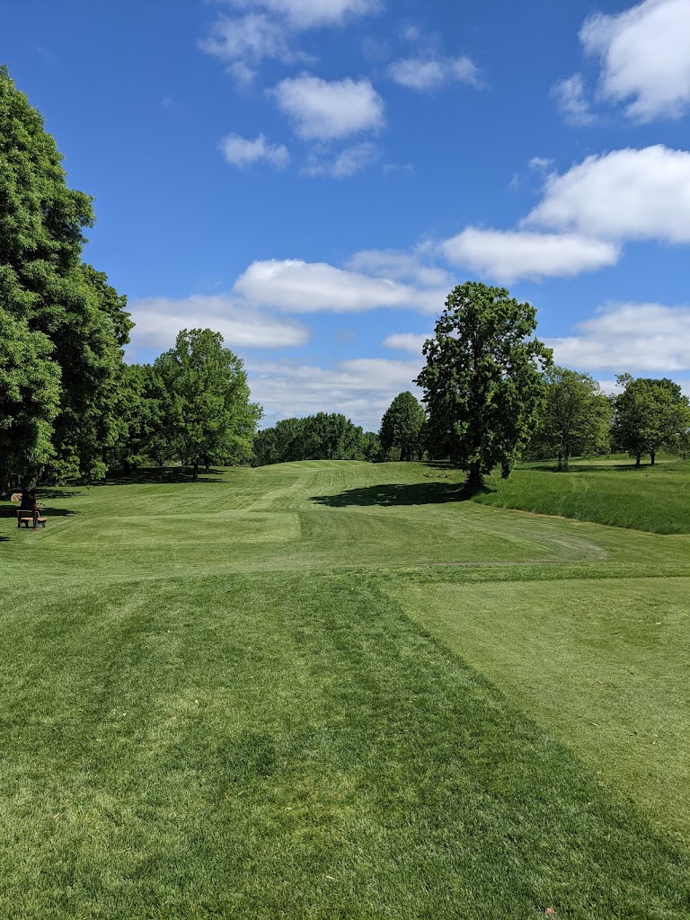 Panoramic view of a lush green golf course at University of Minnesota