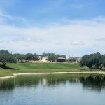 Panoramic view of a lush green golf course at Vaaler Creek Golf Club. Smooth