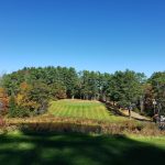 Panoramic view of a lush green golf course at Val Halla Golf & Recreation. Smooth