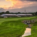 Panoramic view of a lush green golf course at Valhalla Golf Club. Smooth