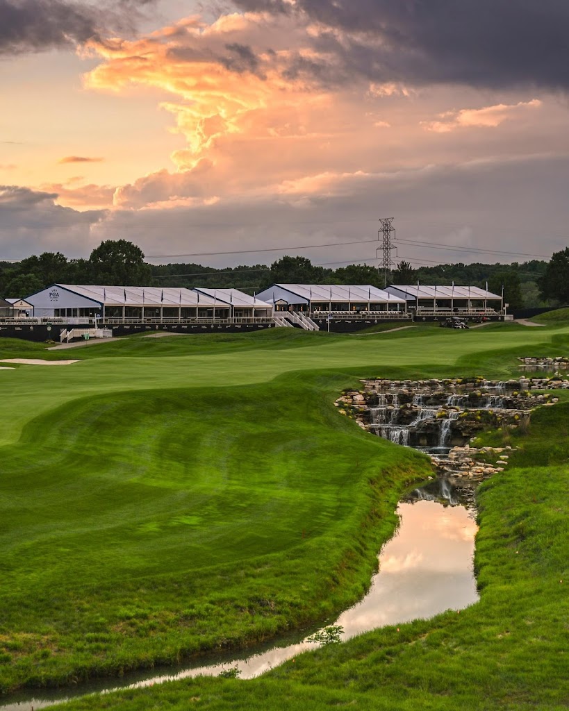 Panoramic view of a lush green golf course at Valhalla Golf Club. Smooth