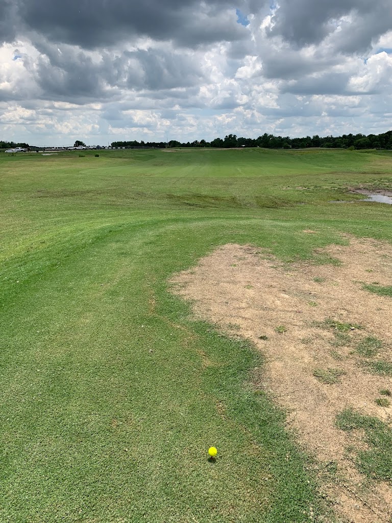 Panoramic view of a lush green golf course at Valley Point Golf Course. Smooth
