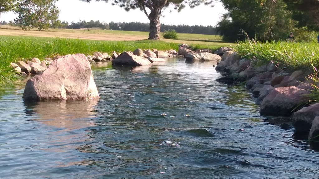 Panoramic view of a lush green golf course at Valley View Country Club. Smooth