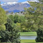Panoramic view of a lush green golf course at Valley View Golf Course. Smooth