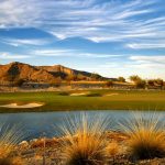 Panoramic view of a lush green golf course at Verrado Golf Club. Smooth